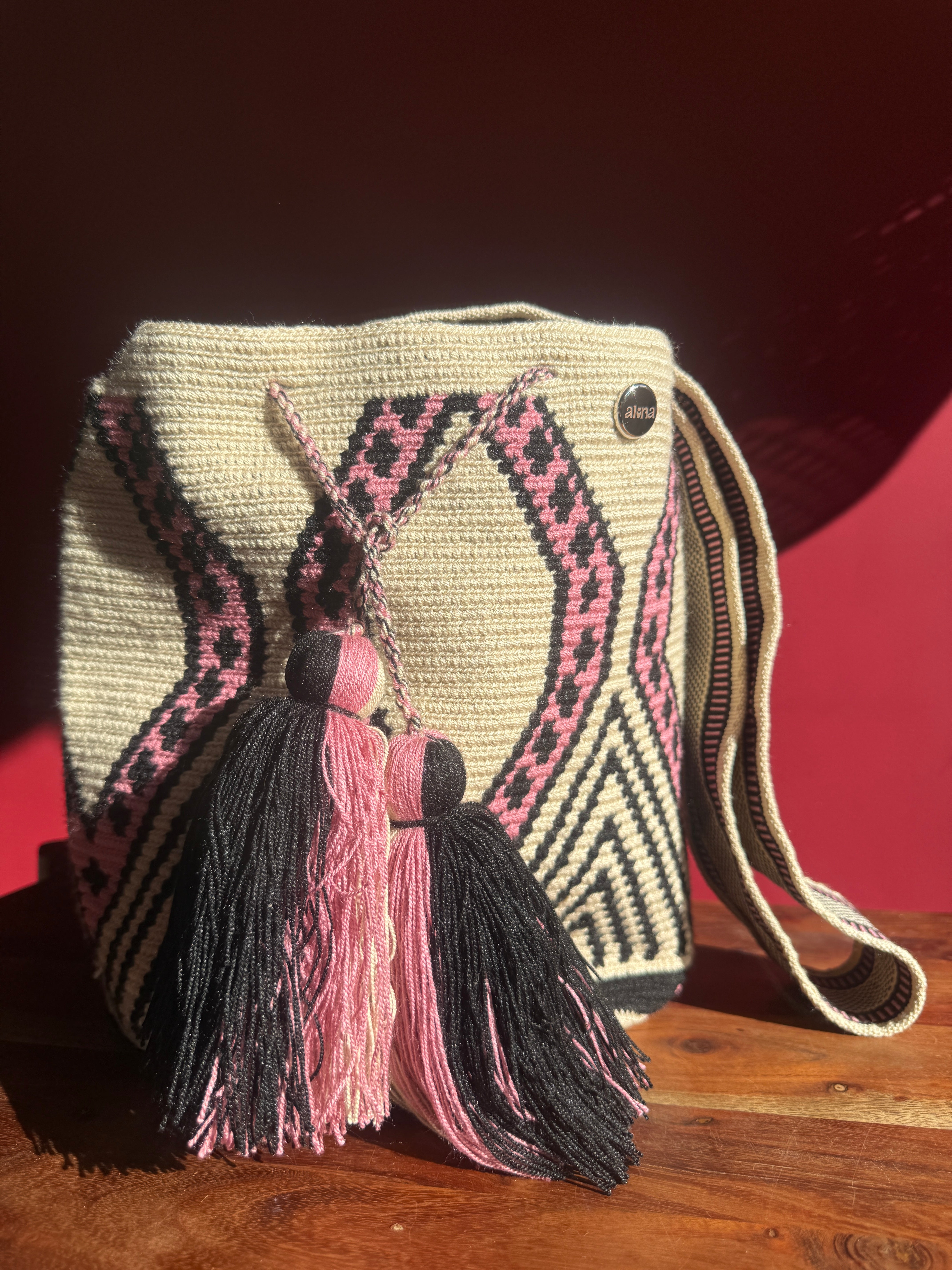 Dulce — pink wave motif and tassels